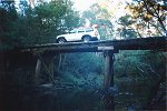 Cruiser on a log bridge at Lake Jasper