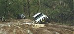 Mark's cruiser negotiating deep mud holes.