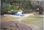 Safe water crossing by using a tarp.