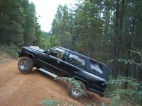 Getting some air over the crest of a steep hill climb