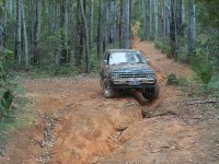 Cameron crossing the deep ruts at the bottom of Nanga hill